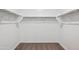 Walk-in closet with shelving and carpet flooring at 12456 E Bahia Ct, Florence, AZ 85132
