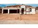 New construction home featuring a two-car garage and a modern design at 12456 E Bahia Ct, Florence, AZ 85132