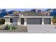 Charming home featuring a three-car garage, neutral paint, and desert landscaping with mountains in the background at 12456 E Bahia Ct, Florence, AZ 85132