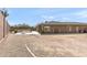 The house features a spacious backyard with a pool, firepit, and ample space for outdoor activities and enjoyment at 12493 S 179Th Ln, Goodyear, AZ 85338