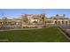Beautiful village center with manicured lawn and ample parking at 12493 S 179Th Ln, Goodyear, AZ 85338