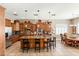 Spacious kitchen with granite countertops, stainless steel appliances, and a center island at 12493 S 179Th Ln, Goodyear, AZ 85338