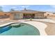 Backyard pool featuring concrete trim and house with an outdoor dining area at 12493 S 179Th Ln, Goodyear, AZ 85338