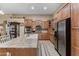 Kitchen featuring a spacious island with a sink, stainless steel appliances, and plenty of cabinets for storage at 14694 W Mandalay Ln, Surprise, AZ 85379