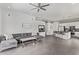 Living space with open concept to the kitchen featuring tile floors and lots of natural light at 15691 N 104Th Pl, Scottsdale, AZ 85255