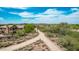 Desert landscaped community walking path with mountain views at 15691 N 104Th Pl, Scottsdale, AZ 85255