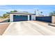 Spacious garage with a wide driveway and convenient side access at 1607 E Gable Ave, Mesa, AZ 85204