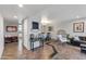 Spacious living area boasts decorative accents, tile floors, and a relaxing chair at 1607 E Gable Ave, Mesa, AZ 85204