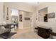 Entertaining Bonus Room with a TV, neutral carpet, and an open layout perfect for gatherings at 17613 W Gelding Dr, Surprise, AZ 85388