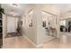 Inviting entryway features tiled flooring and an open layout, providing seamless transitions to the living spaces at 17613 W Gelding Dr, Surprise, AZ 85388