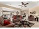 Open concept living room seamlessly connects to the kitchen, promoting a spacious and inclusive environment at 17613 W Gelding Dr, Surprise, AZ 85388