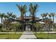 Elegant community entrance with 'The Post' signage, inviting gate, and lush landscaping at 1948 W Rowel Rd, Phoenix, AZ 85085