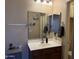 Bathroom featuring a clean sink and mirrors at 2132 W Gold Dust Ave, San Tan Valley, AZ 85144