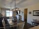 Well lit dining room with modern fixtures and furniture at 2132 W Gold Dust Ave, San Tan Valley, AZ 85144