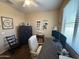 This home office features a Liberty safe, a desk, and a comfortable rolling chair at 2132 W Gold Dust Ave, San Tan Valley, AZ 85144