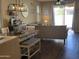 Open-concept living and dining area with neutral colors and lots of natural light at 2132 W Gold Dust Ave, San Tan Valley, AZ 85144