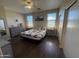 Cozy bedroom featuring a comfortable bed, matching nightstands, and ample closet space for storage at 2132 W Gold Dust Ave, San Tan Valley, AZ 85144