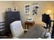 Bright and cozy office space featuring a desk, sewing machine, and rustic decor at 2132 W Gold Dust Ave, San Tan Valley, AZ 85144