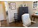 Comfortable office space with liberty safe, desk, chair, and plenty of natural light at 2132 W Gold Dust Ave, San Tan Valley, AZ 85144
