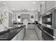 Spacious kitchen featuring modern cabinetry, premium appliances, and a functional layout for efficient meal preparation at 2149 W Rowel Rd, Phoenix, AZ 85085