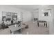 Spacious living room featuring neutral color palettes and a game table, ideal for entertaining at 2149 W Rowel Rd, Phoenix, AZ 85085