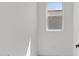 Bright room with a window showing the construction in progress, awaiting your personal touch at 2149 W Rowel Rd, Phoenix, AZ 85085