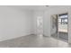 Bright, open room with tile floors and sliding doors to the outdoors; a versatile living space at 2149 W Rowel Rd, Phoenix, AZ 85085