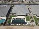 Aerial view of a modern home with a backyard oasis, featuring a pool, spa, and lush landscaping at 22867 E Via Las Brisas --, Queen Creek, AZ 85142