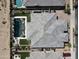 An aerial shot displays an elegant home with a backyard oasis featuring a dark pool and modern landscaping at 22867 E Via Las Brisas --, Queen Creek, AZ 85142