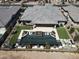 Aerial view of a modern home with a backyard oasis, featuring a pool, spa, and lush landscaping at 22867 E Via Las Brisas --, Queen Creek, AZ 85142
