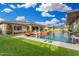 Backyard with pool, lush landscaping, and outdoor entertaining space at 22867 E Via Las Brisas --, Queen Creek, AZ 85142