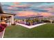 Expansive backyard with pool, pergola, and well-manicured landscaping at 22867 E Via Las Brisas --, Queen Creek, AZ 85142