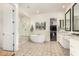 Elegant bathroom featuring a soaking tub, walk-in shower, and stylish tile flooring at 22867 E Via Las Brisas --, Queen Creek, AZ 85142