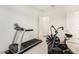 Home gym featuring a treadmill and stationary bike and carpet flooring at 22867 E Via Las Brisas --, Queen Creek, AZ 85142