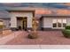 Home featuring desert landscaping, a covered entrance and modern door at 22867 E Via Las Brisas --, Queen Creek, AZ 85142