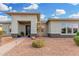 Home featuring desert landscaping, a covered entrance and modern door at 22867 E Via Las Brisas --, Queen Creek, AZ 85142