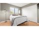 Cozy bedroom featuring a comfortable bed, natural light from the window, and a sleek, modern lamp at 2315 W Union Hills Dr # 124, Phoenix, AZ 85027