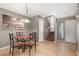Cozy dining area with modern light fixture and adjacent stairway at 2315 W Union Hills Dr # 124, Phoenix, AZ 85027