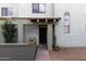 Inviting front entrance showcasing the building's architectural details and well-maintained landscaping at 2315 W Union Hills Dr # 124, Phoenix, AZ 85027