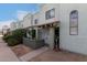 Charming building with a well-maintained facade, covered entrance, and mature landscaping in a communal setting at 2315 W Union Hills Dr # 124, Phoenix, AZ 85027