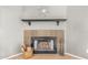 Traditional fireplace with tiled surround and decorative mantle at 2315 W Union Hills Dr # 124, Phoenix, AZ 85027