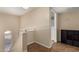 Spacious hallway with warm tan walls and neutral tiled floors leads to secondary spaces at 2315 W Union Hills Dr # 124, Phoenix, AZ 85027