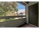 Private patio features wood deck, green space views, and outdoor storage at 2315 W Union Hills Dr # 124, Phoenix, AZ 85027