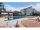 Community pool with lounge seating, dining table, BBQ, and shaded outdoor space ideal for entertainment at 2315 W Union Hills Dr # 124, Phoenix, AZ 85027