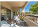 Comfortable balcony with seating and outdoor views with stone columns at 33550 N Dove Lakes Dr # 1041, Cave Creek, AZ 85331