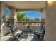 Relaxing balcony with seating, views, and attractive stone accents at 33550 N Dove Lakes Dr # 1041, Cave Creek, AZ 85331