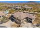 Spacious desert home featuring a private driveway, tile roof, and low-maintenance desert landscaping at 33550 N Dove Lakes Dr # 1041, Cave Creek, AZ 85331