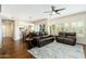 Spacious living room with hardwood floors, comfortable seating, and ample natural light at 33550 N Dove Lakes Dr # 1041, Cave Creek, AZ 85331