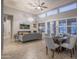 Open-concept dining area with a stylish table, comfortable seating, and plenty of natural light at 33601 N 64Th St, Scottsdale, AZ 85266