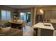 Open kitchen featuring an island with bar seating, stainless steel appliances and a dining area at 4090 S Virginia Way, Chandler, AZ 85249